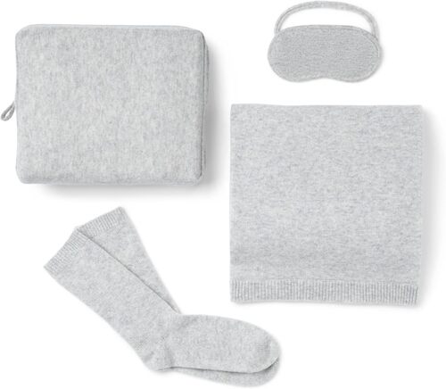 ALT text: cashmere travel set for flights including scarf socks and eye mask